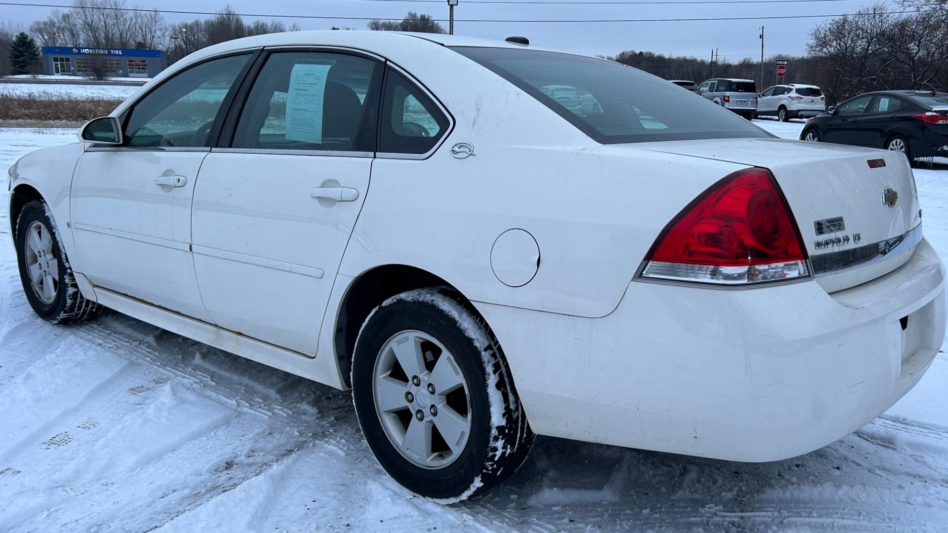 2009 White Chevrolet Impala LT (2G1WT57K791) with an 3.5L V6 OHV 12V FFV engine, 4-Speed Automatic Overdrive transmission, located at 17255 hwy 65 NE, Ham Lake, MN, 55304, 0.000000, 0.000000 - Photo#6